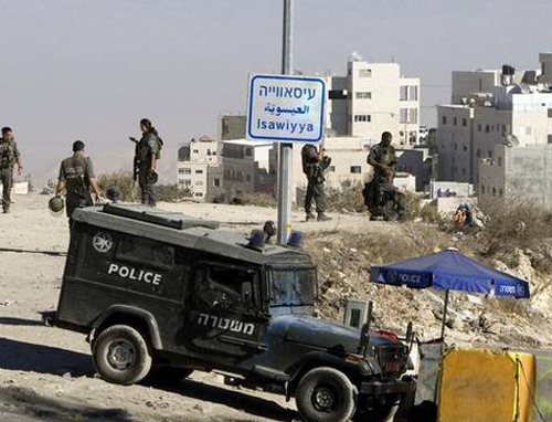 العيسوية تخضع لحصار عسكري وسط حملات دهم واعتقالات ومواجهات