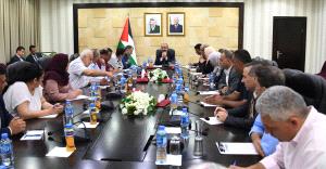 اشتية يبحث تعزيز التكامل مع الاتحاد الوطني للمؤسسات الاهلية