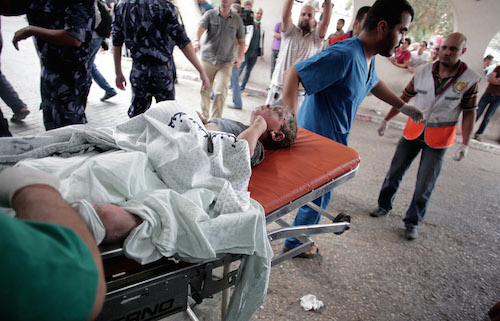 74 شهيدا و350 جريحا في مجزرة حي الشجاعية